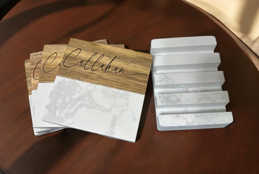 a close up of a table with a name plate