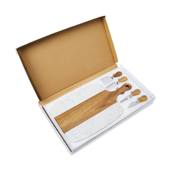 a set of four wooden cheese knives in a box