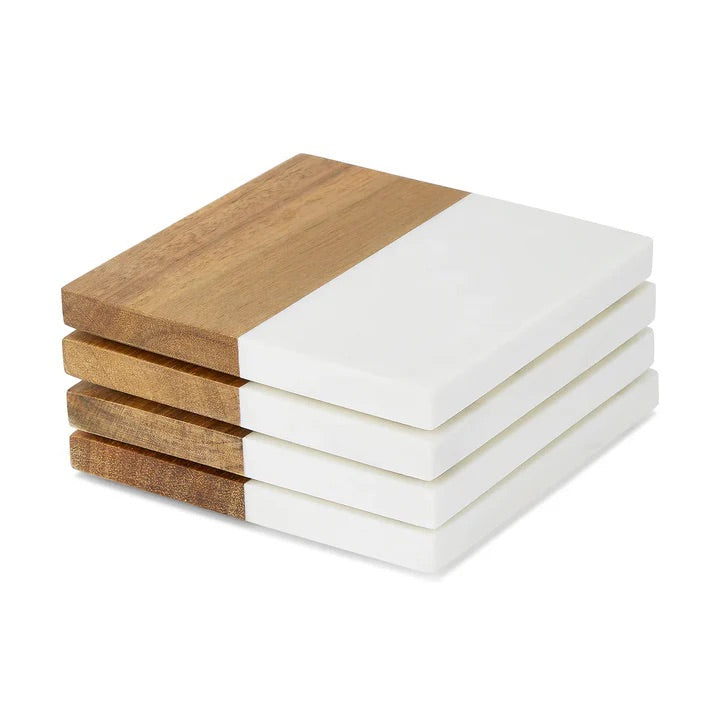 a stack of four white and wood coasters