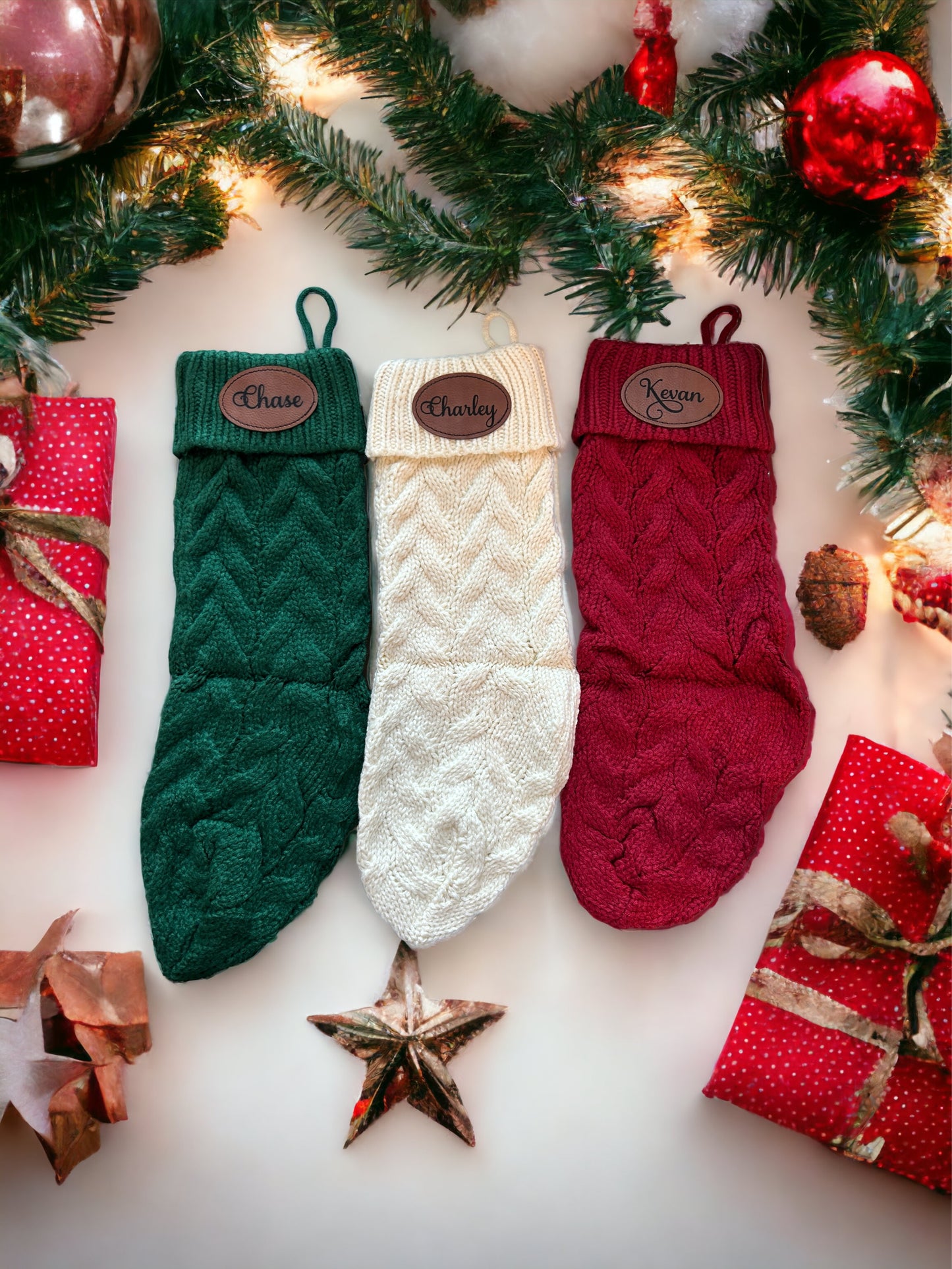 a group of christmas stockings sitting on top of a table