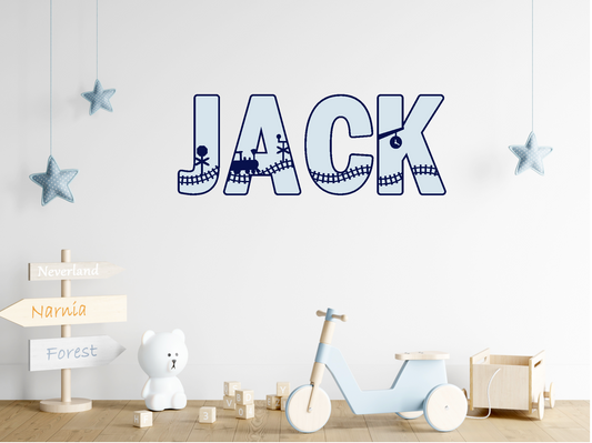 A wall with a large blue nameplate that says "JACK" in the center, surrounded by various toys and decorations.