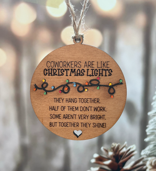 a wooden ornament hanging from a christmas tree