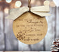 A wooden ornament with a white ribbon tied around it, featuring a quote about always being the first thing and making a wish.