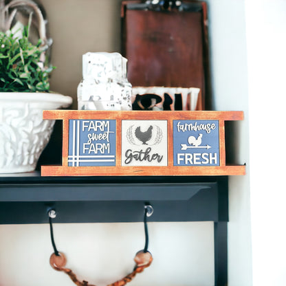 a shelf with a wooden sign and a potted plant