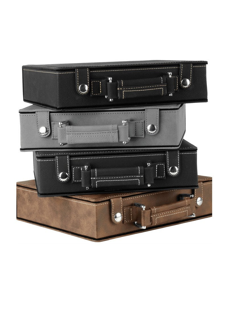 three pieces of luggage stacked on top of each other