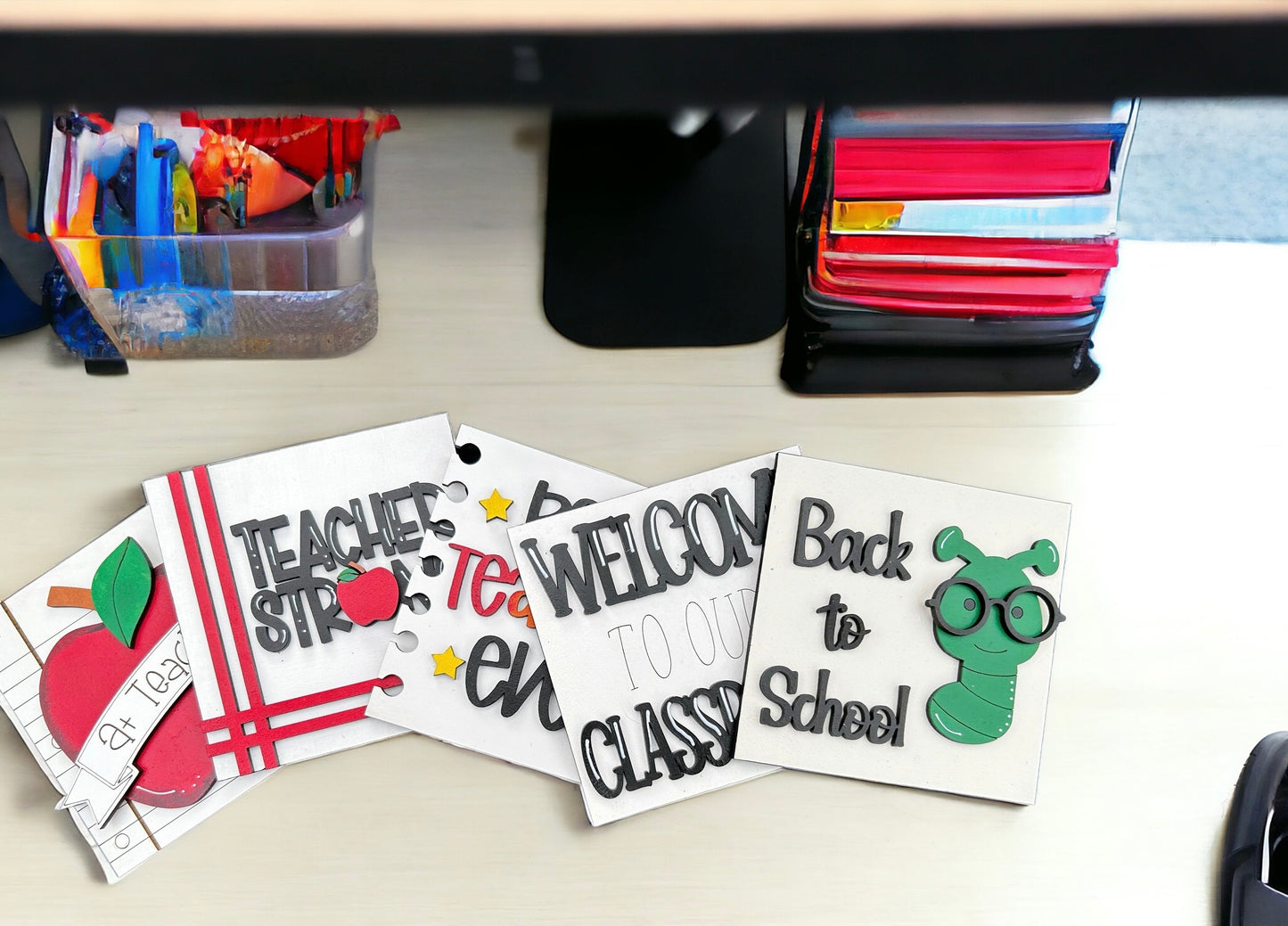 a bunch of stickers that are on a desk