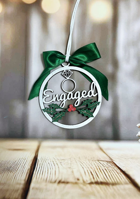 a christmas ornament hanging from a wooden table