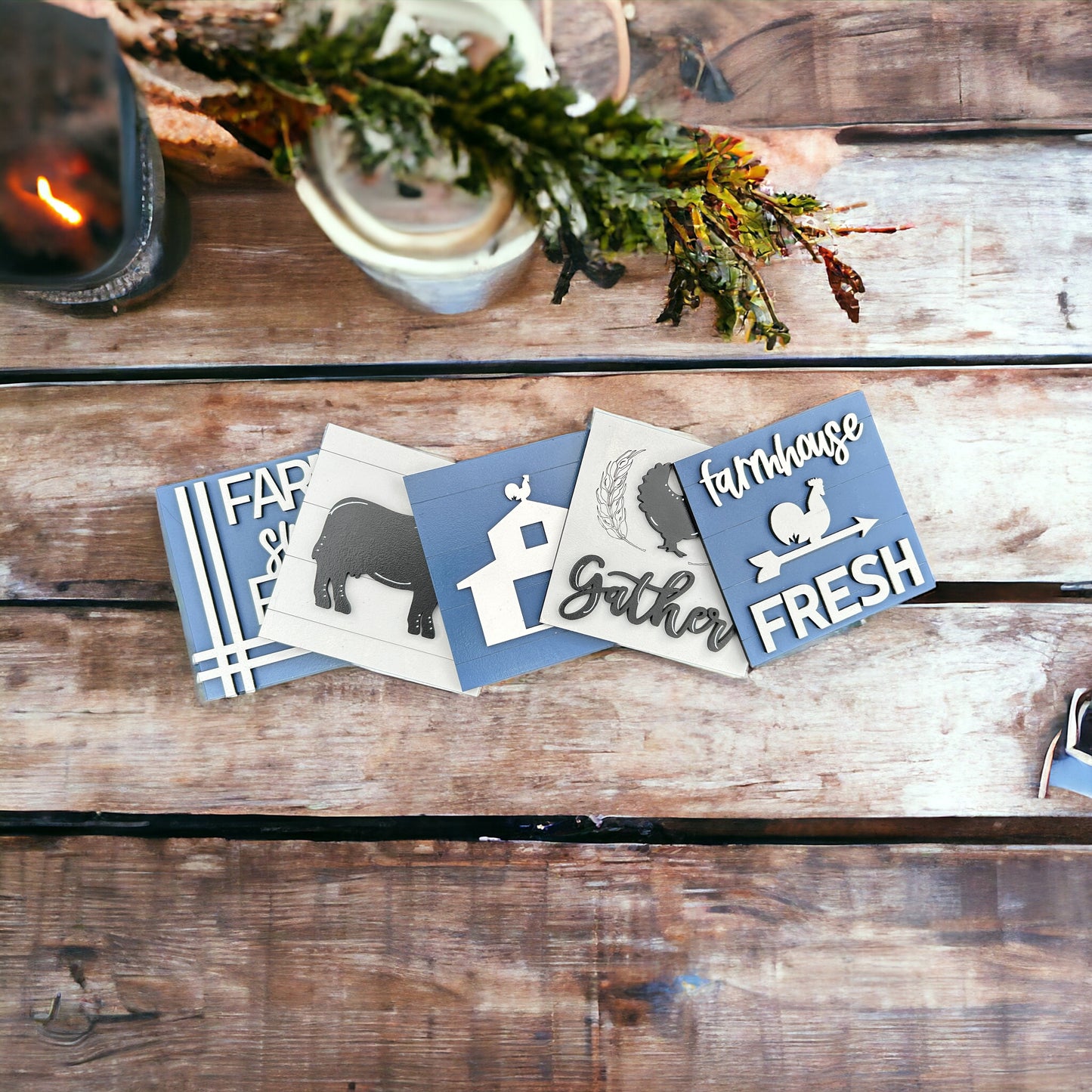 a couple of stickers sitting on top of a wooden table