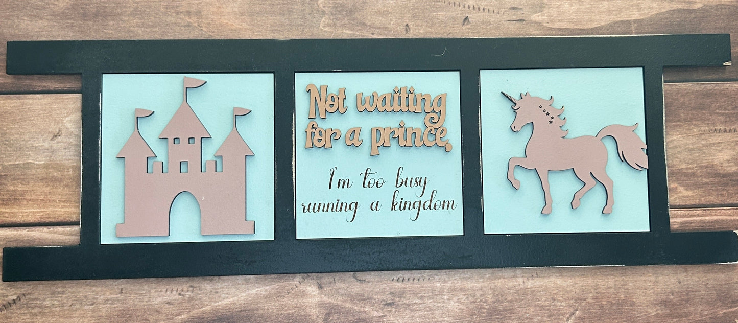 Decorative wall art with text and animal illustrations on a wooden panel.