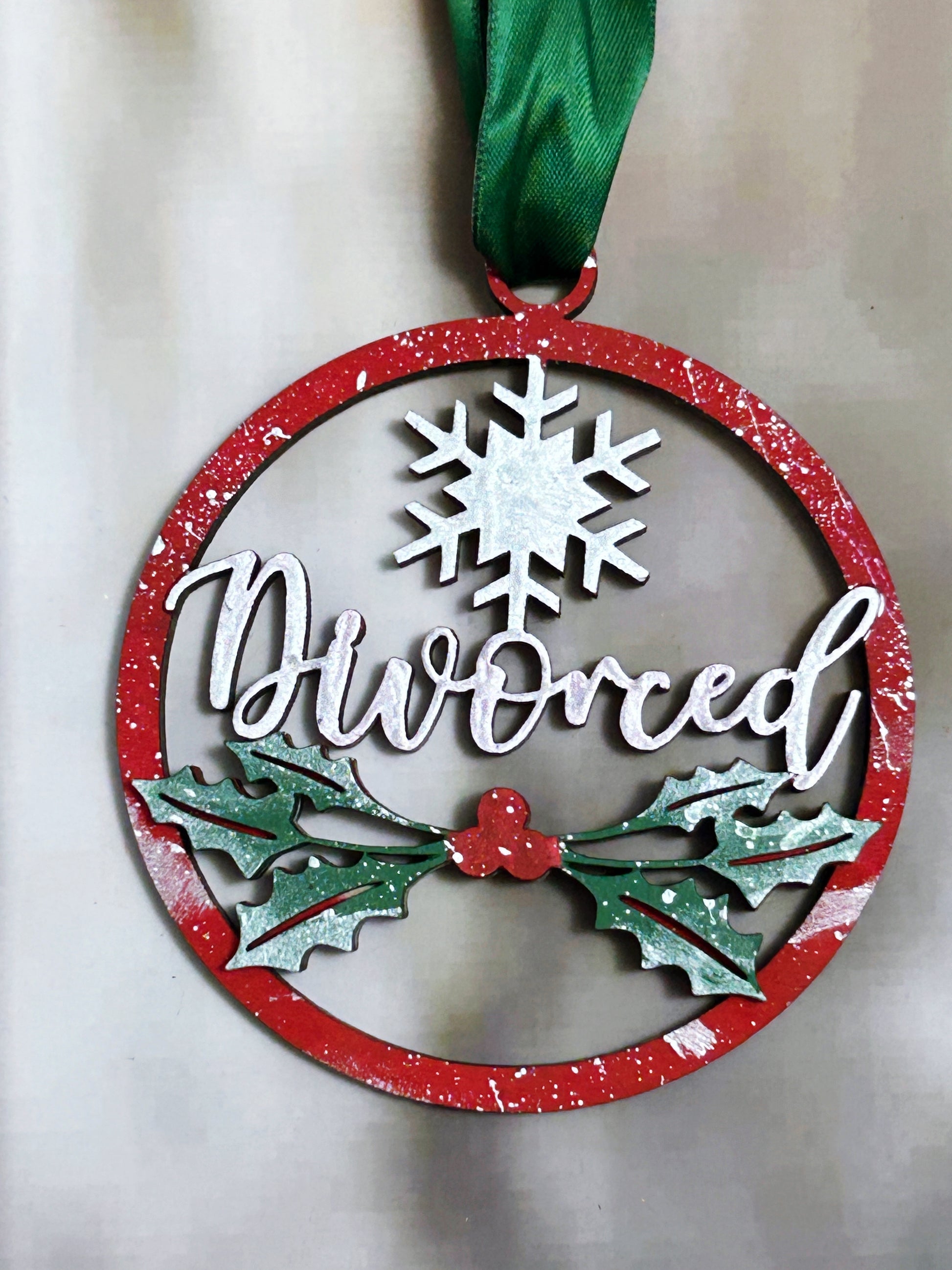 a christmas ornament hanging on a wall