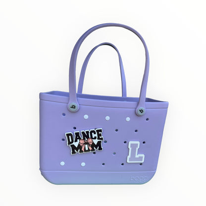 a purple bag with a picture of a girl on it