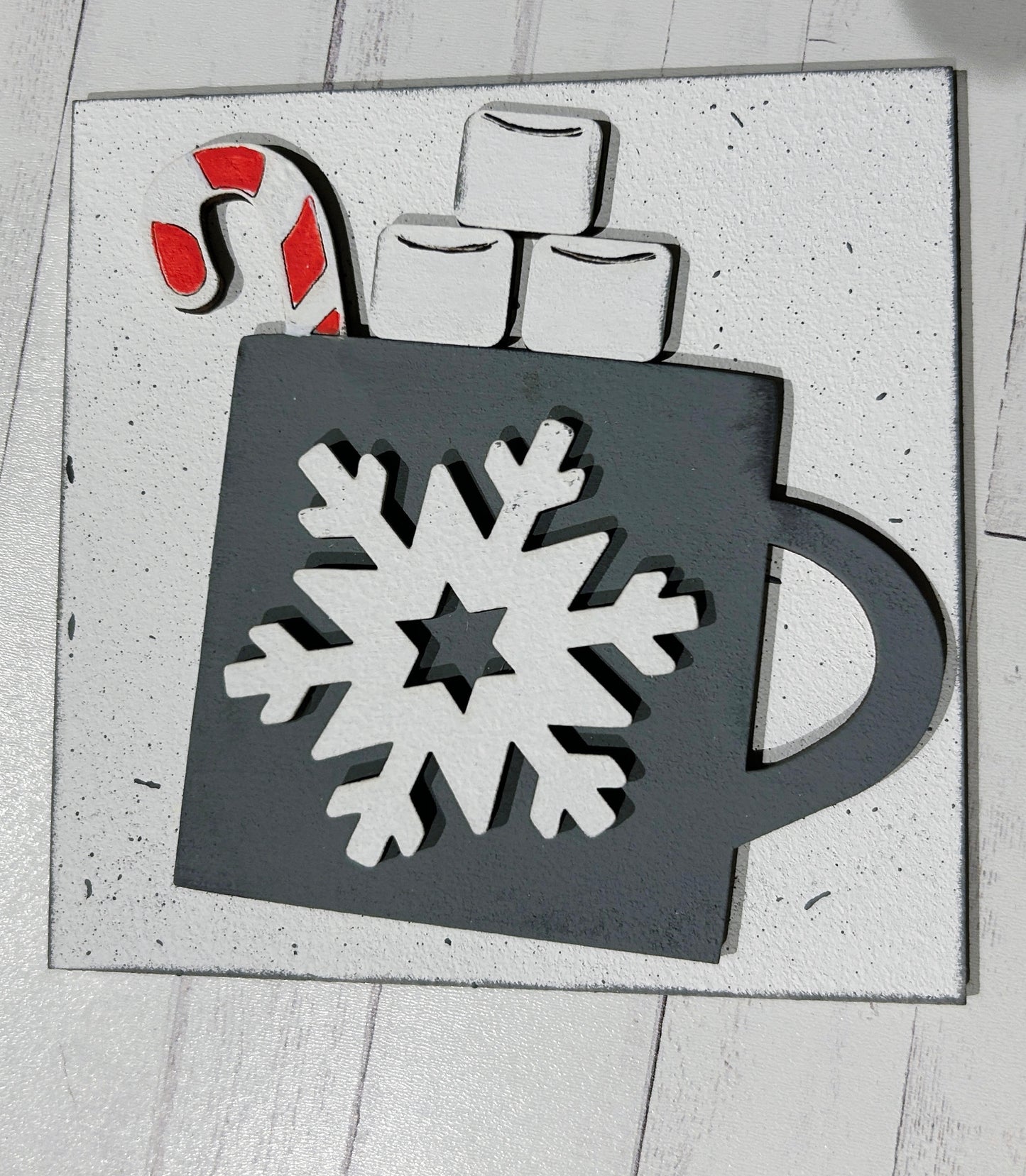 a picture of a mug with a snowflake on it